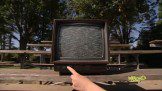 A hand pointing at the projector