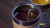 Closeup shot of two cans with candle wax
