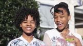 Two girls with curly and silky hair with smiling faces