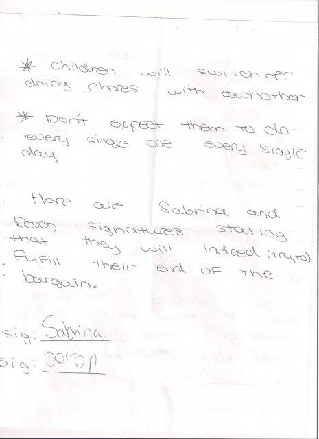 A handwritten note on a piece of paper.