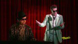 Two men are acting in theatre
