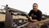 Man working at Demolition Derby center