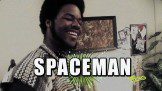Spaceman Poster with a man in the background