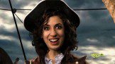 Smiling portrait of a woman wearing hat