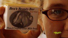 Woman holding Bea's Beauty Bar
