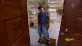 Boy in front of a door