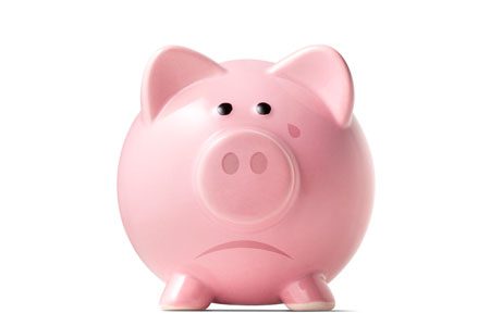 A pink piggy bank on a white background.