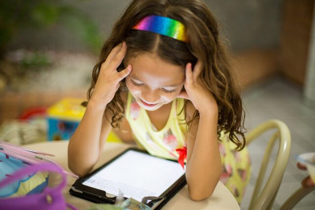 Kids looking at ipad
