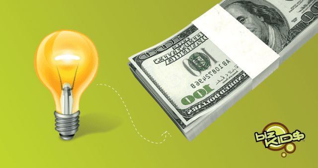 A light bulb next to a dollar bill.